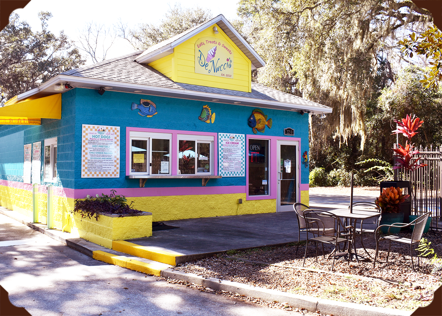 A multicolored building on a sunny day.